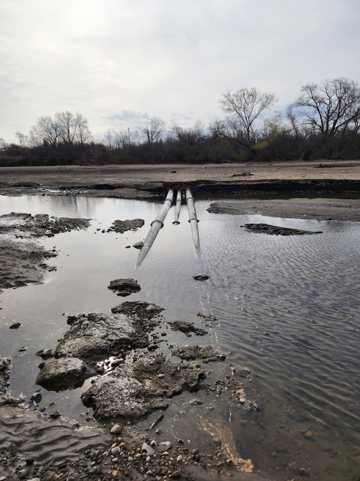 Pipes exposed in the Fox River riverbed after the Carpentersville dam was removed